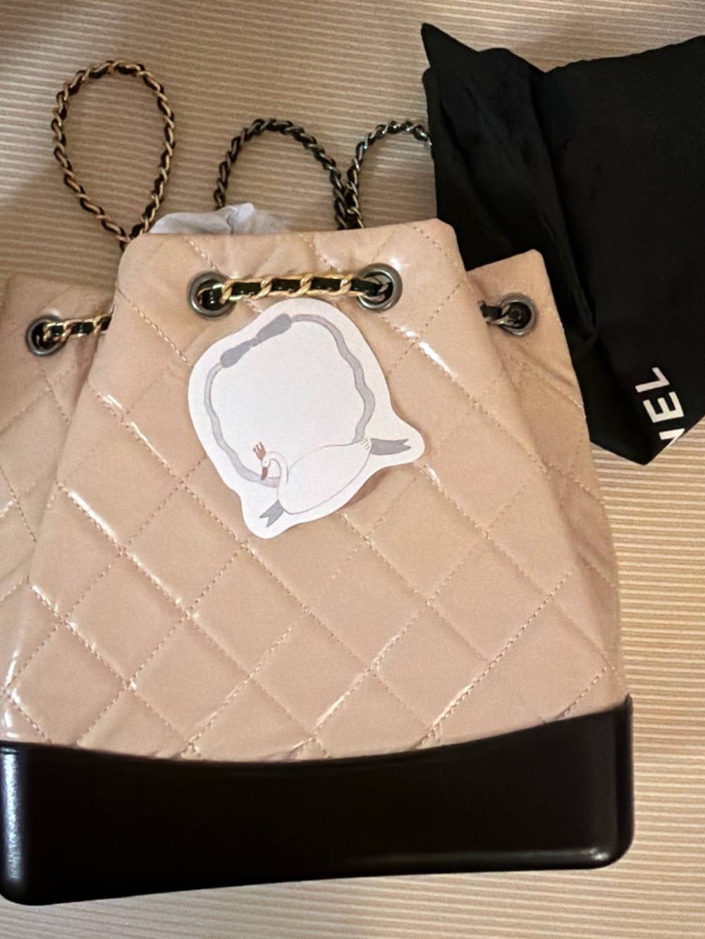 Brand new Beige and black backpack Gabrielle with two tone chain